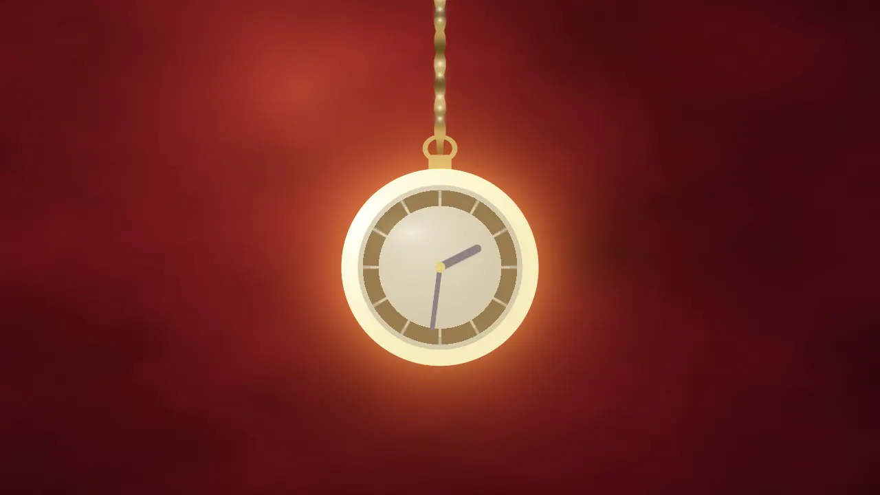 A gold pocket watch with a plain dial swinging on its chain over burgundy velvet