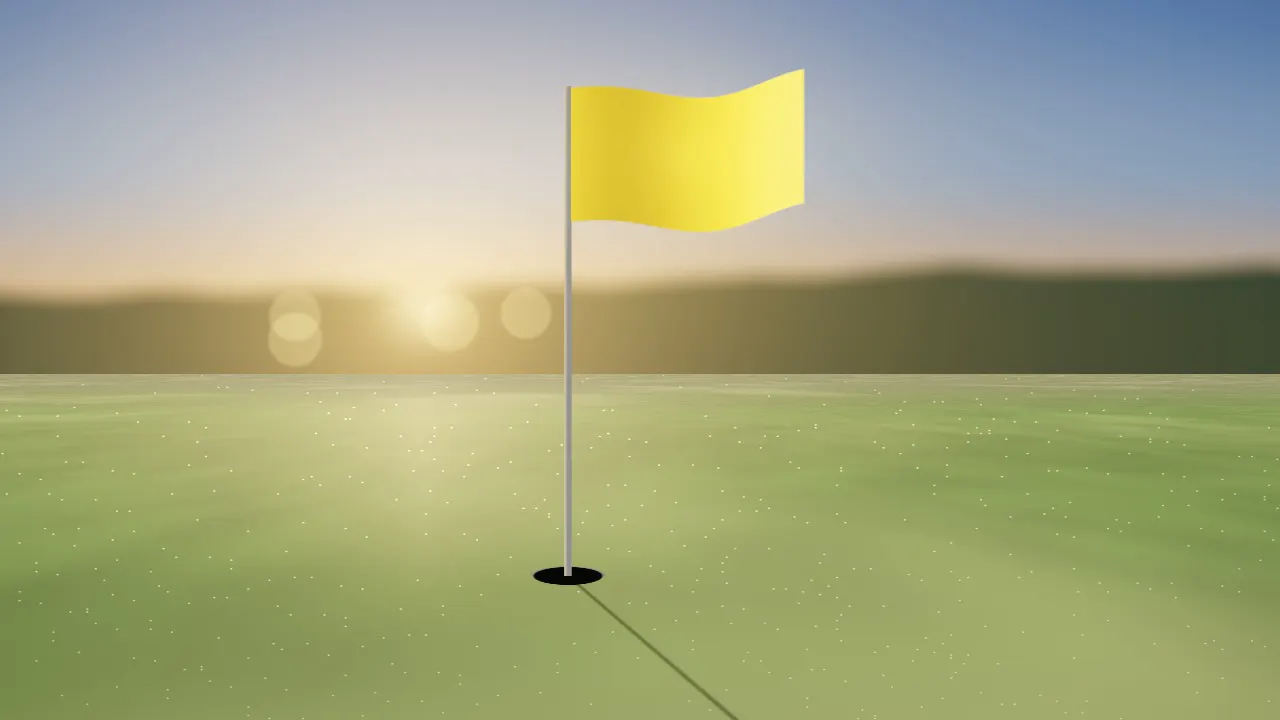 A plain yellow flag on its pin, lit by a low gold sun over a dewy putting green