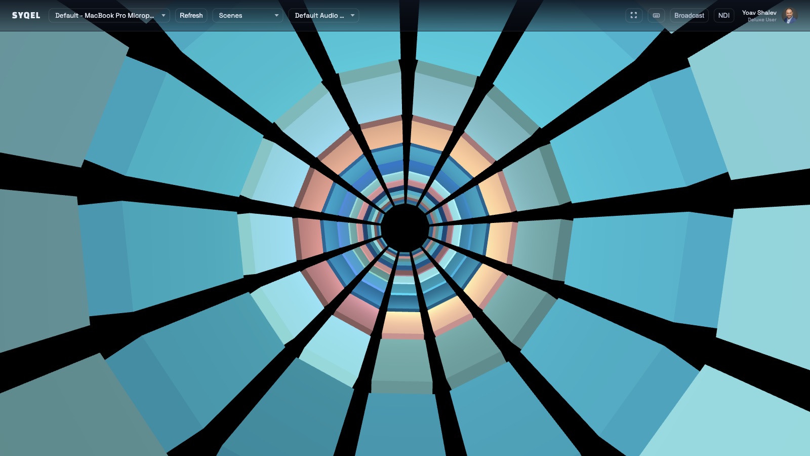 SYQEL Desktop — the main screen with a live visual, source picker, Scenes, Broadcast and NDI